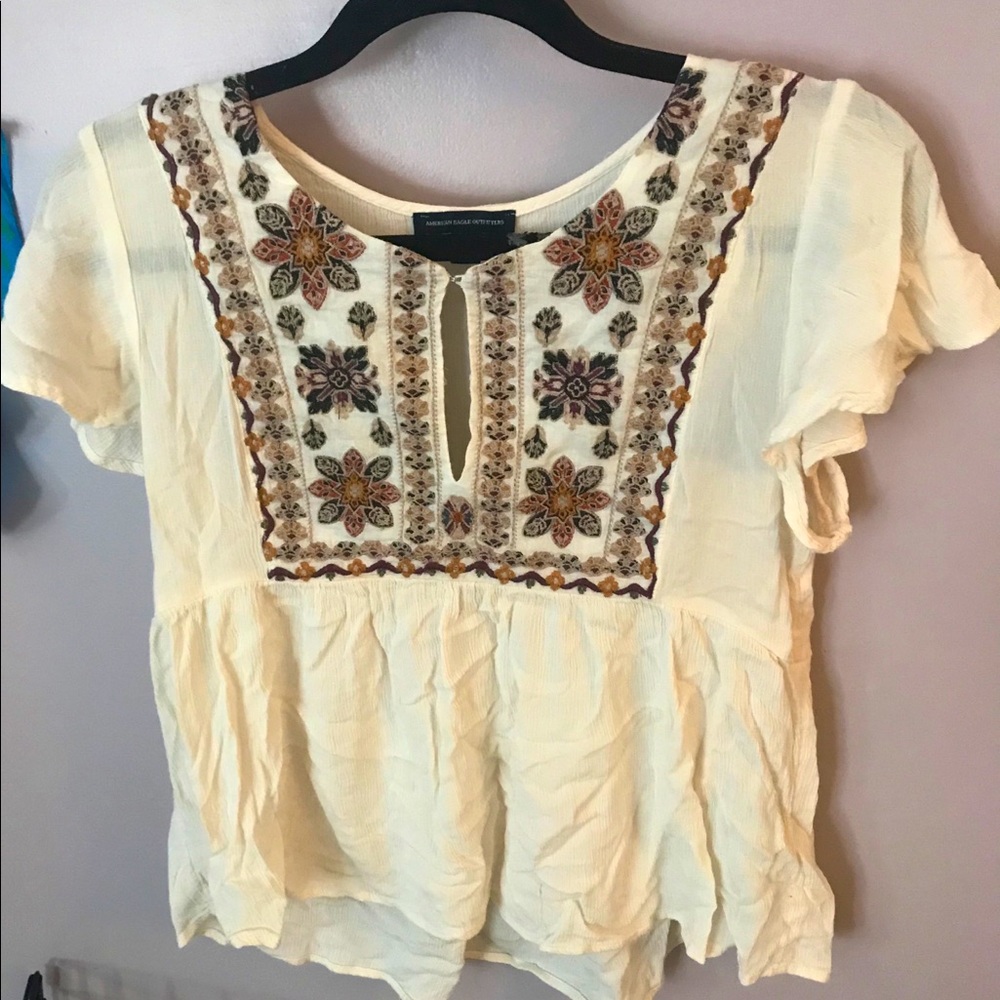 White Flowey embroidered top.